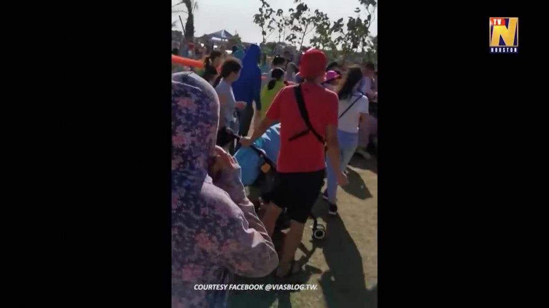 Kite swings child into the air at Taiwan festival